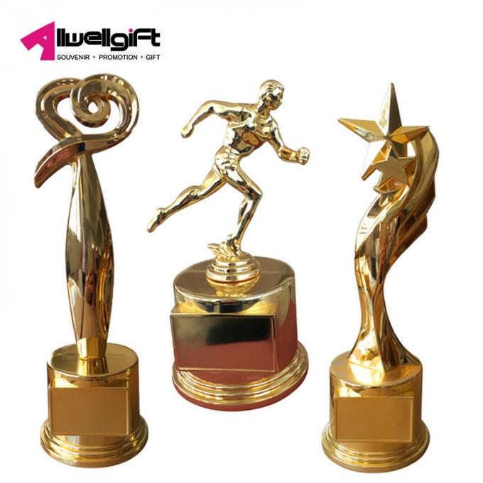 La série faite sur commande de sports d'or de tasse de trophée en métal pour l'événement annuel de souvenir attribue à trophée les métiers en alliage de zinc pour la décoration à la maison