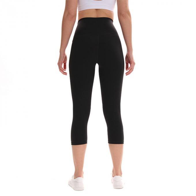 Pantalon cultivé élastique de sports de pantalons de guêtres de hanche de forme physique de yoga de femmes sans couture faites sur commande de guêtres courant les collants s'exerçants plus la taille