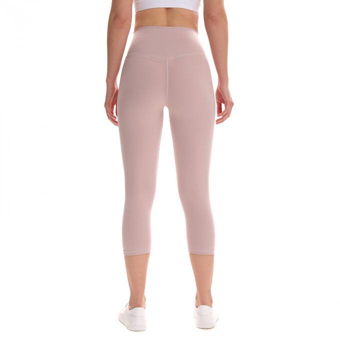 Pantalon cultivé élastique de sports de pantalons de guêtres de hanche de forme physique de yoga de femmes sans couture faites sur commande de guêtres courant les collants s'exerçants plus la taille