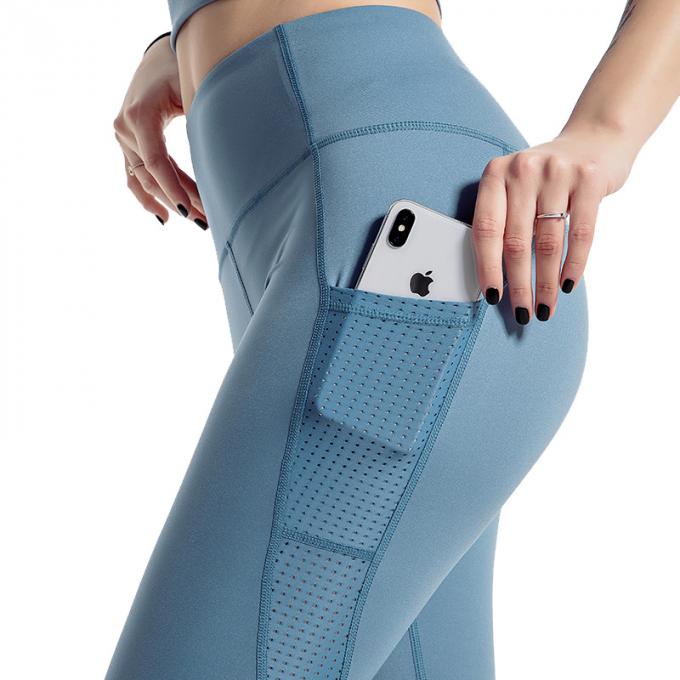 Pantalon serré de yoga de femmes d'usage de gymnase de guêtres de forme physique sexy élevée de taille avec l'usage sportif de gymnase de bout d'activewear de poches crac! crac!