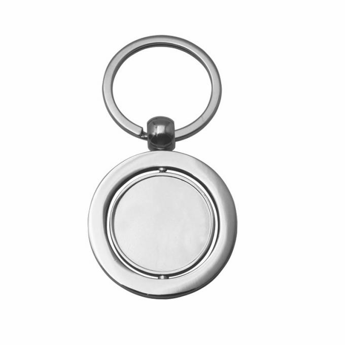 Le porte-clés vide tournant promotionnel fait sur commande de voiture en métal a adapté la chaîne aux besoins du client principale en alliage de zinc de forme ronde