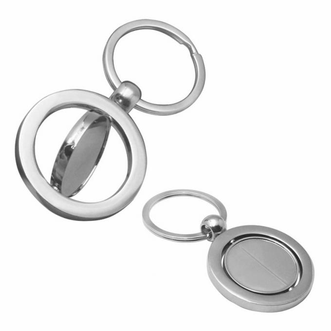 Le porte-clés vide tournant promotionnel fait sur commande de voiture en métal a adapté la chaîne aux besoins du client principale en alliage de zinc de forme ronde