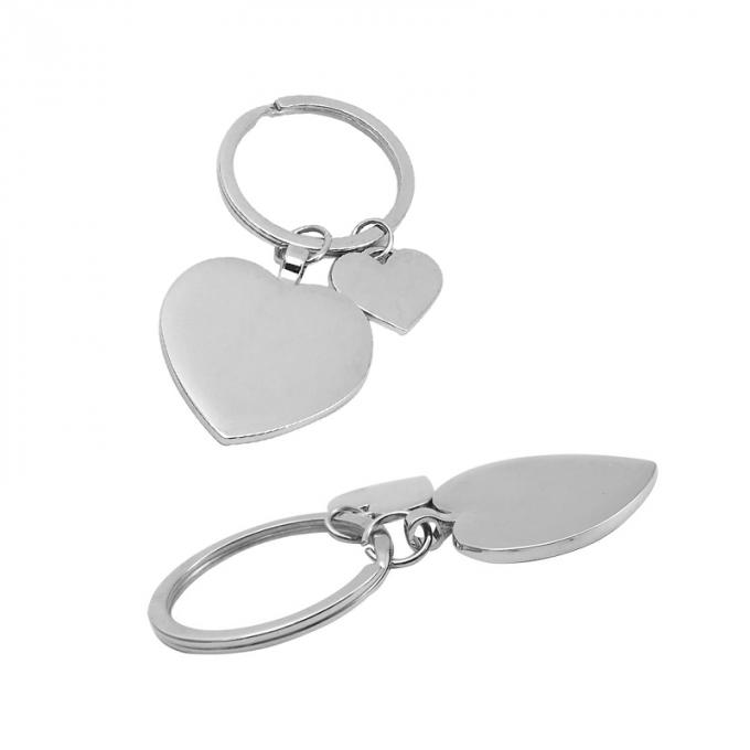Le porte-clés fait sur commande en métal de souvenir de Saint-Valentin a adapté la chaîne aux besoins du client principale en alliage de zinc de forme de coeur