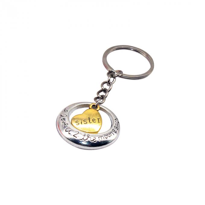 la coutume vend le métal en gros en alliage de zinc de nouveau beau de coeur de forme cadeau créatif de voiture keychian