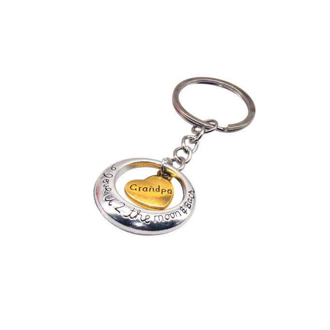 la coutume vend le métal en gros en alliage de zinc de nouveau beau de coeur de forme cadeau créatif de voiture keychian