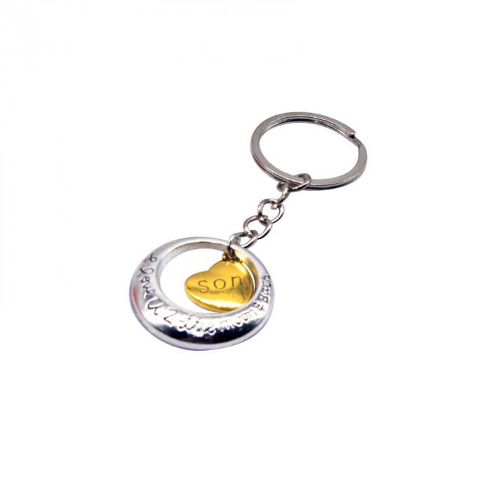 la coutume vend le métal en gros en alliage de zinc de nouveau beau de coeur de forme cadeau créatif de voiture keychian