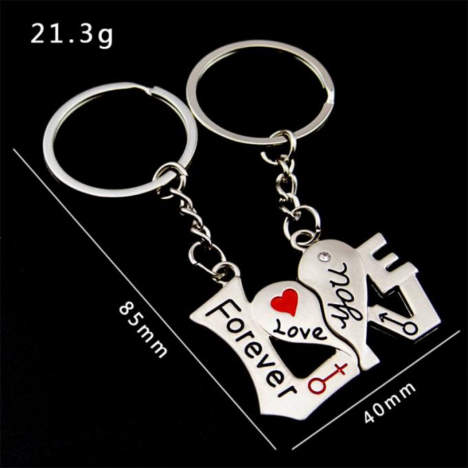 la coutume vend le métal en gros en alliage de zinc de nouveau de fausse pierre beau de coeur de forme cadeau créatif de voiture keychian