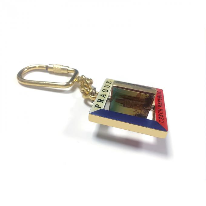 Le souvenir de Prague tournant couvrant d'un dôme le porte-clés en métal de décalque a adapté la chaîne aux besoins du client 3d principale en alliage de zinc